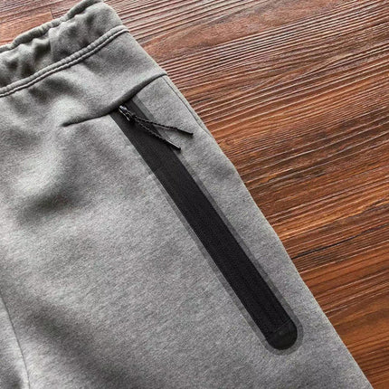PANTALON NIKE TECH FLEECE x GRIS LOUP
