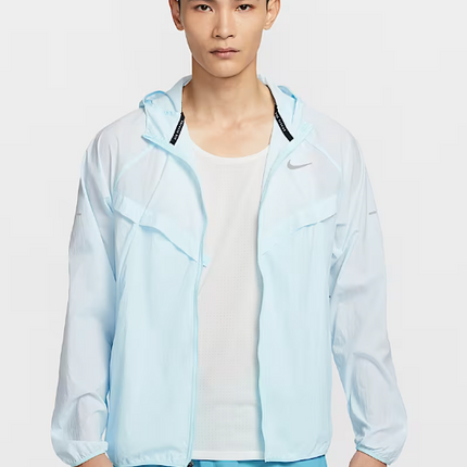 VESTE NIKE IMPERMEABLE BLEU CLAIR