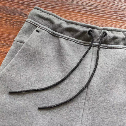 PANTALON NIKE TECH FLEECE x GRIS LOUP