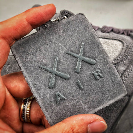 Air Jordan 4 X Kaws grey