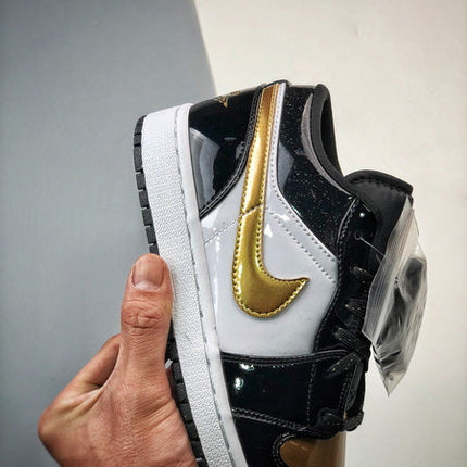 Jordan 1 Low ALT Noir Metallic Doré Blanc