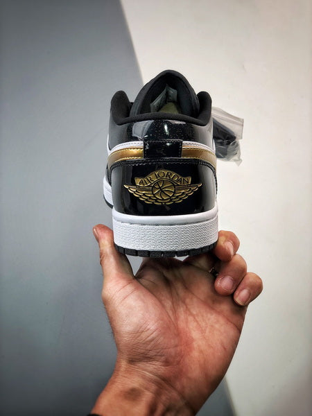 Jordan 1 Low ALT Noir Metallic Doré Blanc