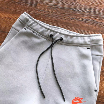 PANTALON NIKE TECH FLEECE x GRIS LOUP/AIGUE-MARINE/ORANGE